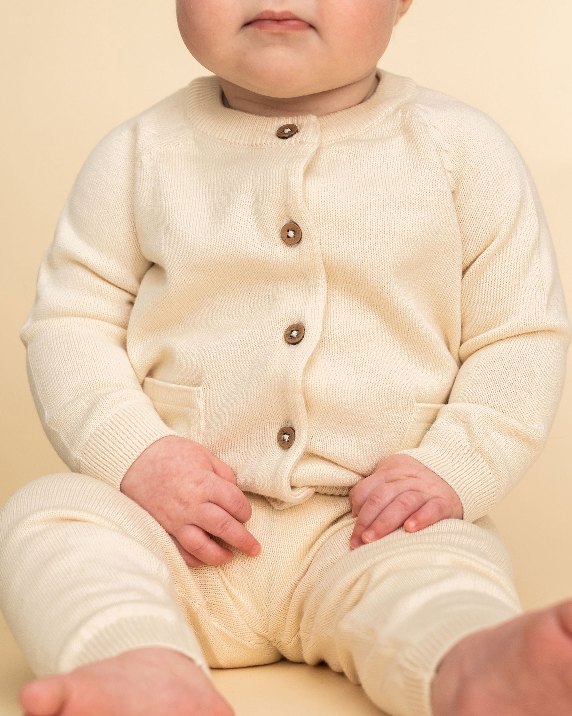 Cream Milan Knit Baby Button Cardigan Sweater (Organic Cotton) Texture