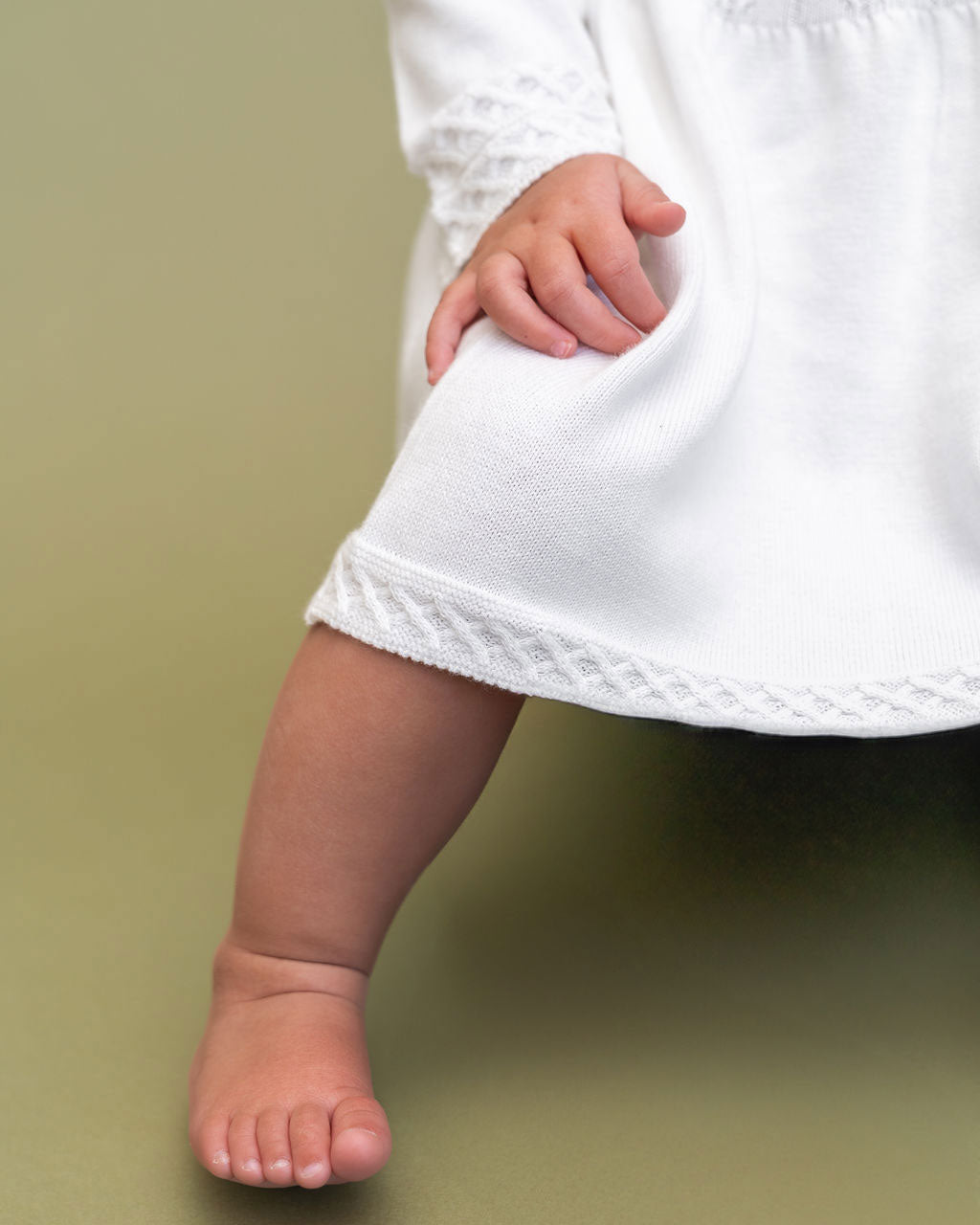 Dove Milan Knit Baby Peter Pan Tulip Sweater Dress (Organic Cotton) Model Hem Detail