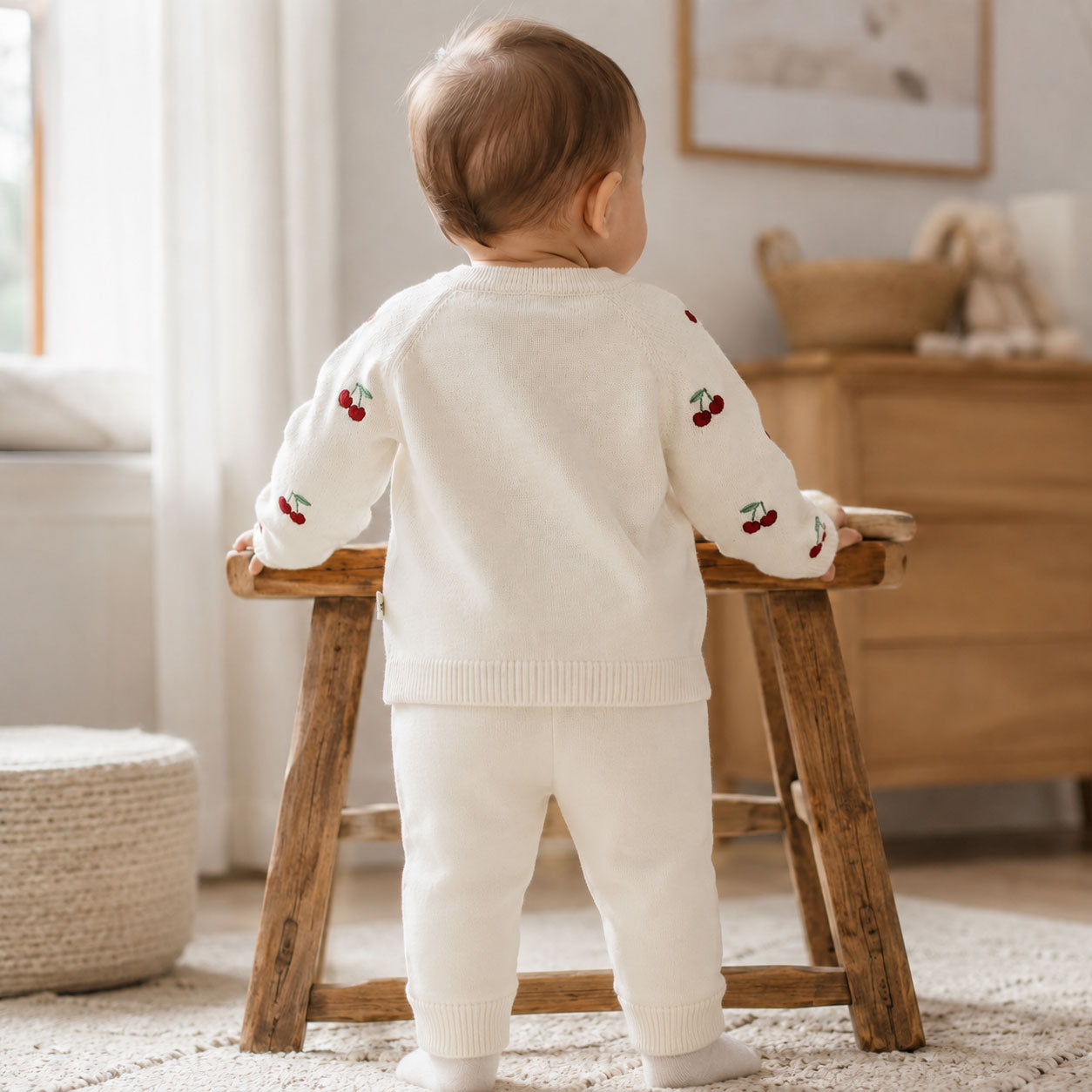 Baby wearing Cherry Embroidered Sweater Knit Baby Cardigan (Organic Cotton) by Viverano