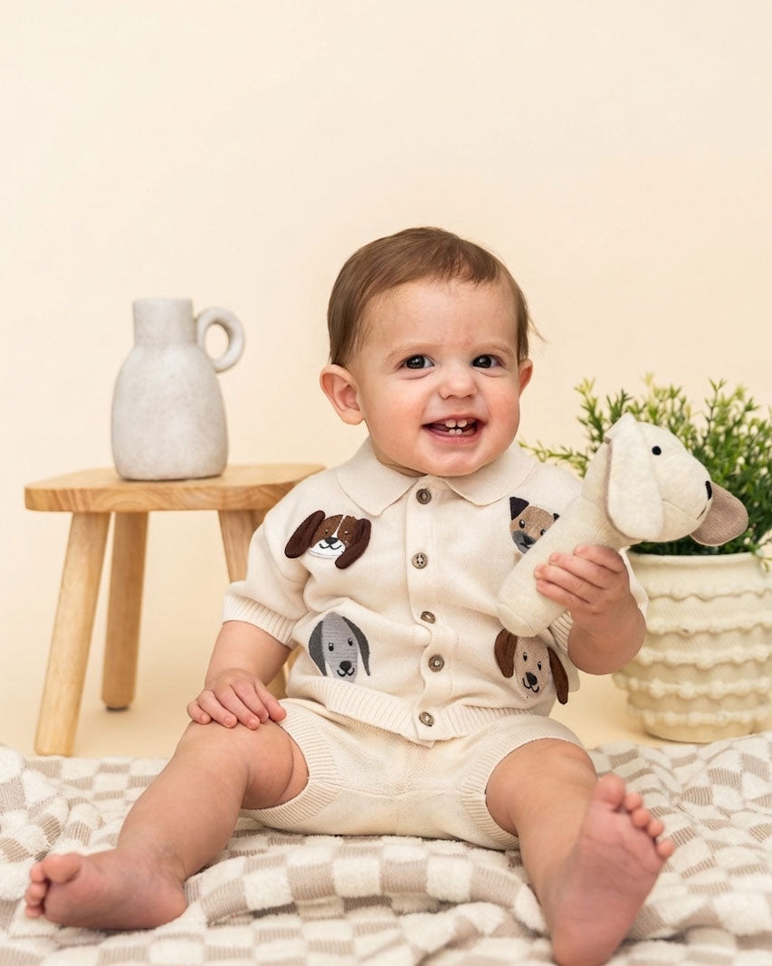 Baby holding Dog - Organic Stuffed Animal Baby Stick Rattle Toy