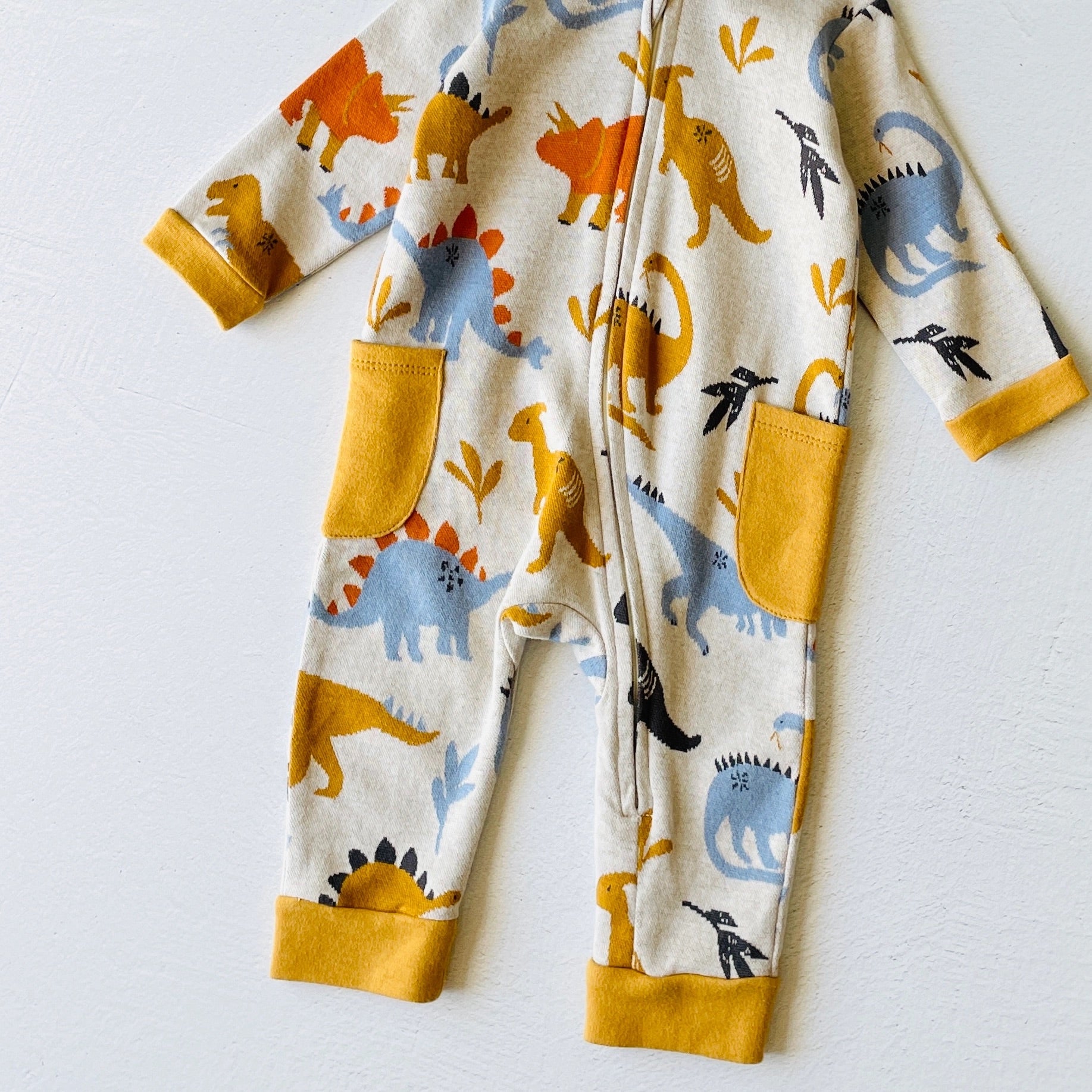 Mono para bebé con capucha y cremallera en jacquard de dinosaurio (algodón orgánico)