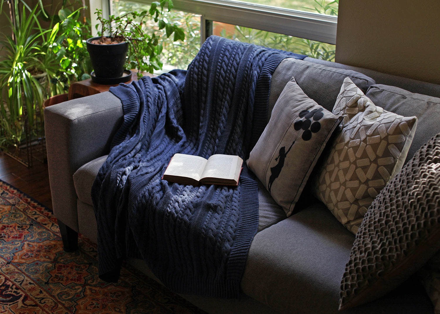 Navy Viverano Organic Cotton Cable Knit Throw on Couch