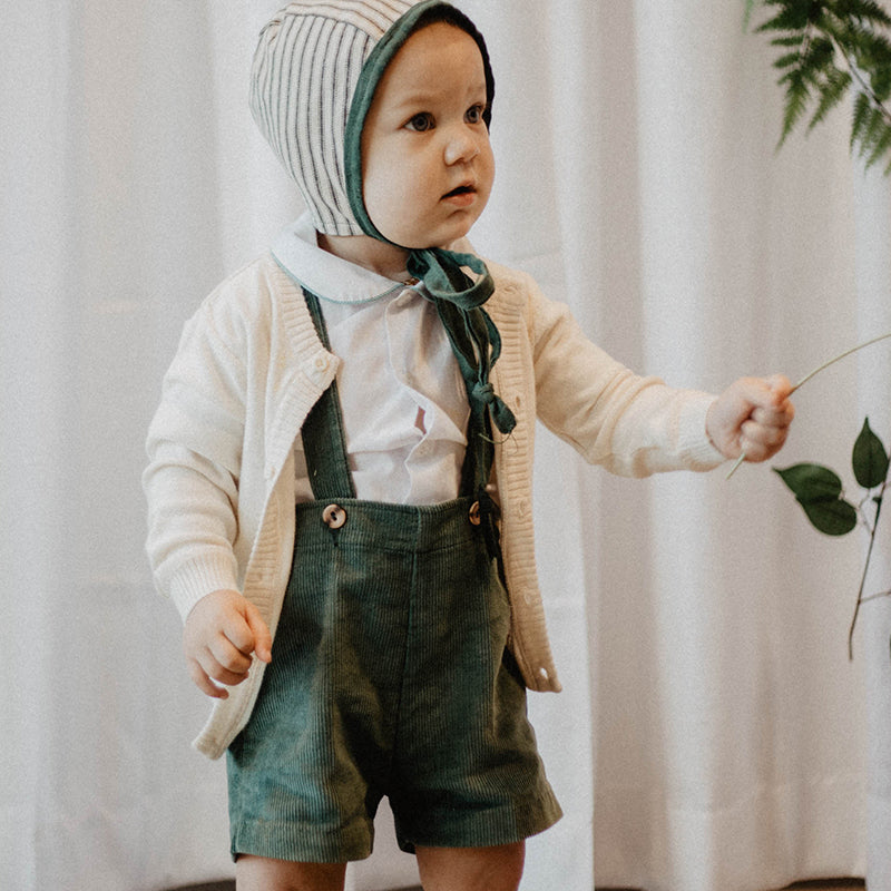 Dove White Viverano Organic Cotton Knit Button Cardigan Sweater for Babies, Model Playing