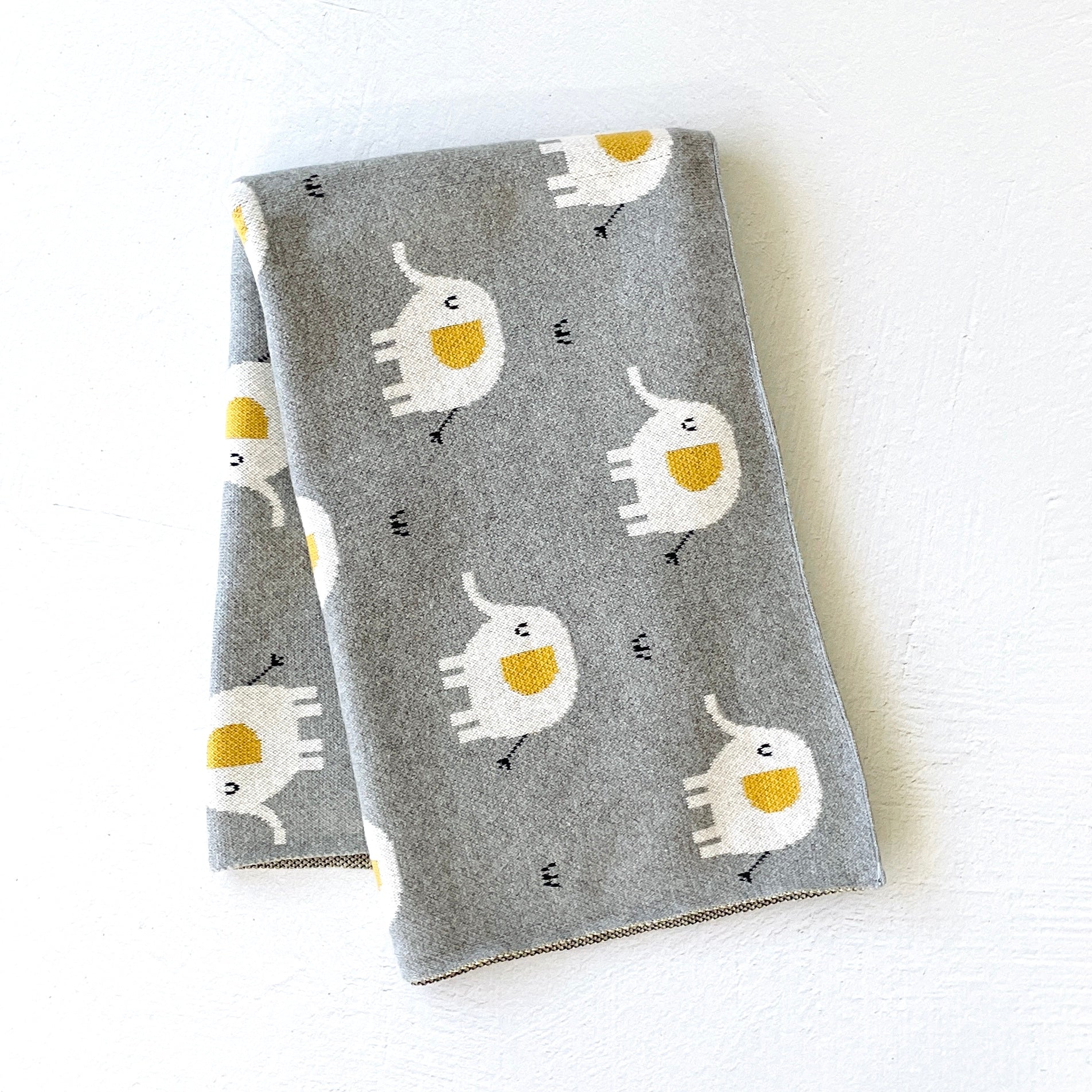 Conjunto de manta y arrullo para bebé de punto jacquard con diseño de elefante (orgánico)