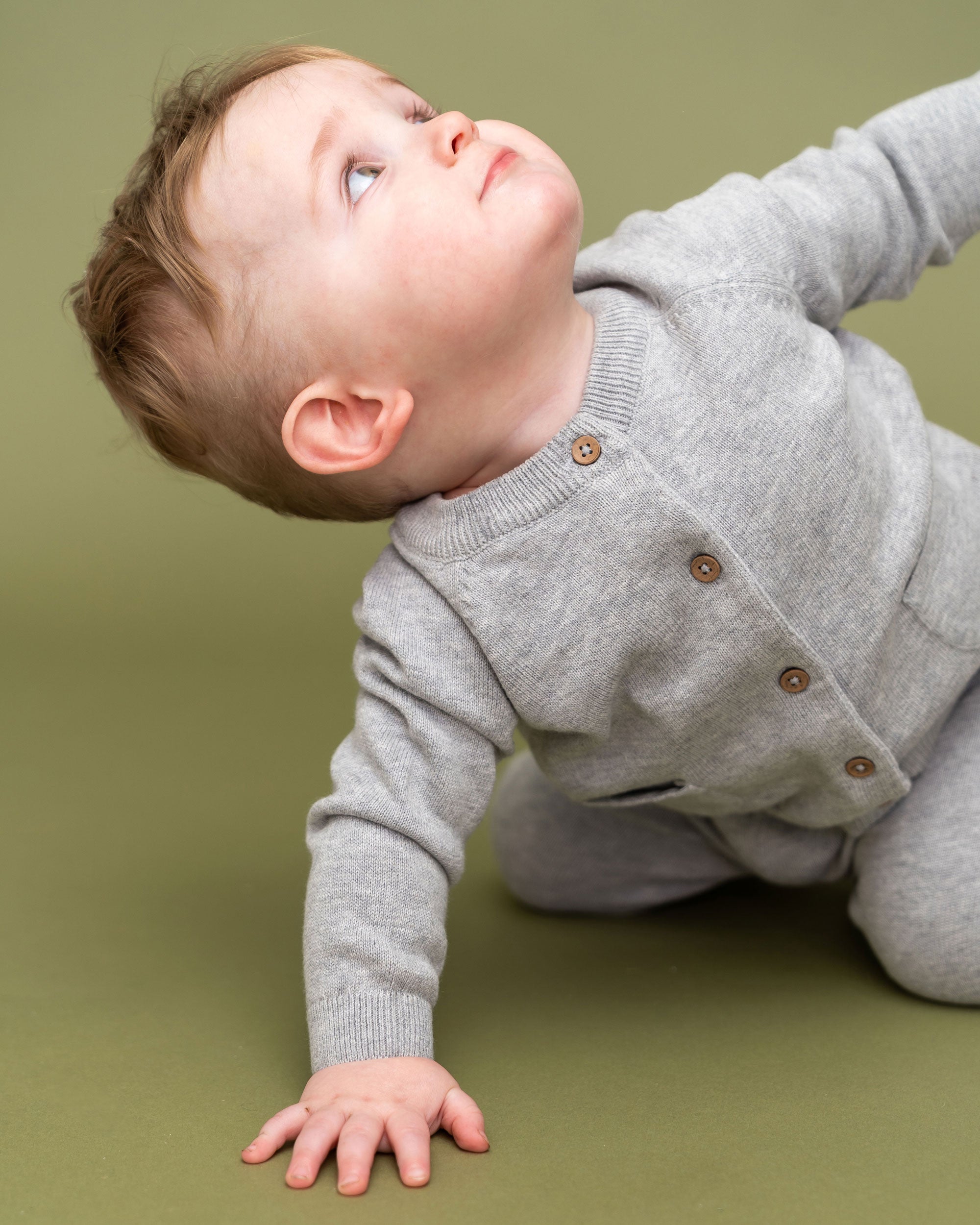 Heather Grey Milan Knit Baby Button Cardigan Sweater (Organic Cotton) Model Movement