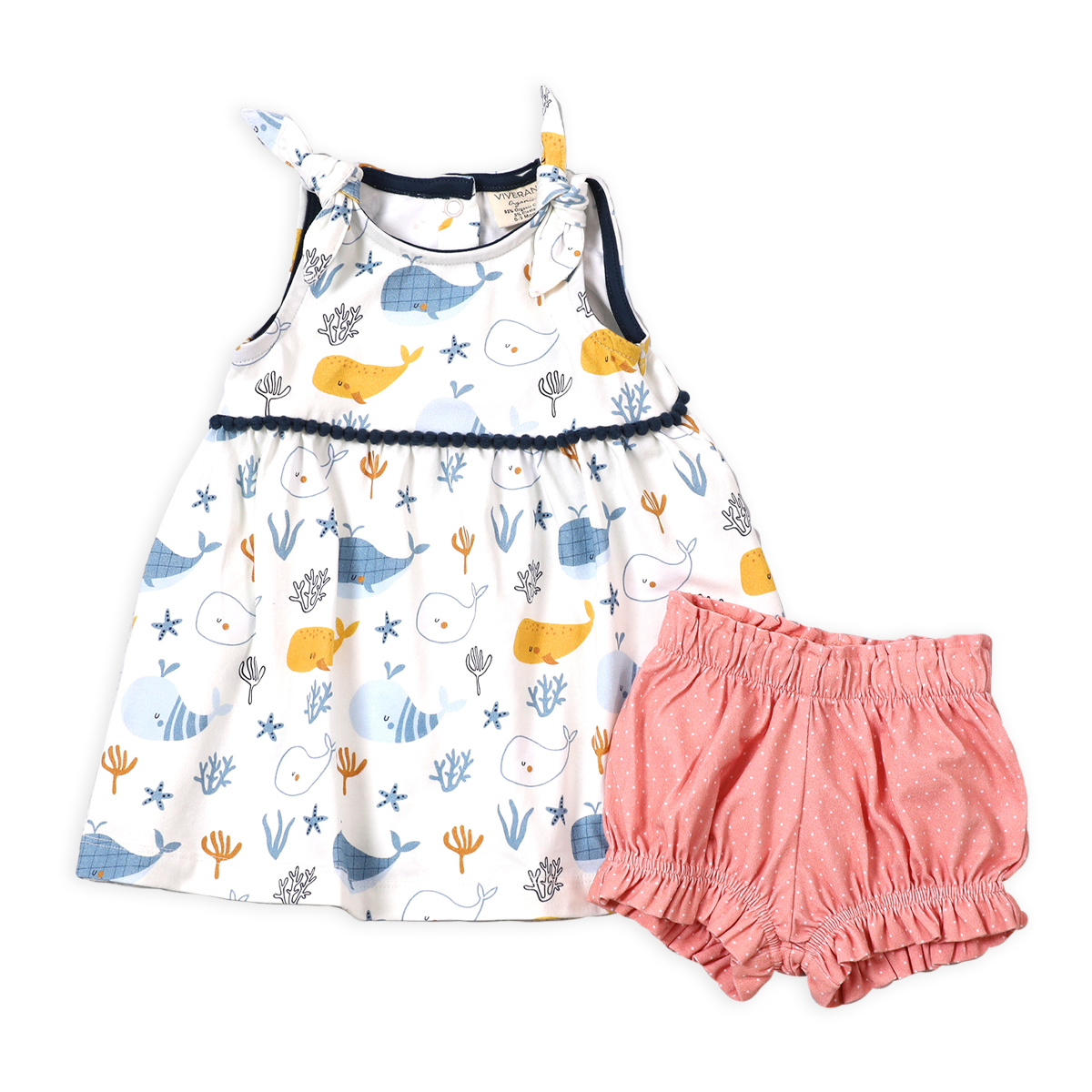 Front of Ocean Whales Shoulder Tie Baby Dress + Bloomer made of organic cotton