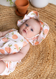 Peaches Cross Strap Ruffle Baby Romper + Sunhat (Organic Jersey)