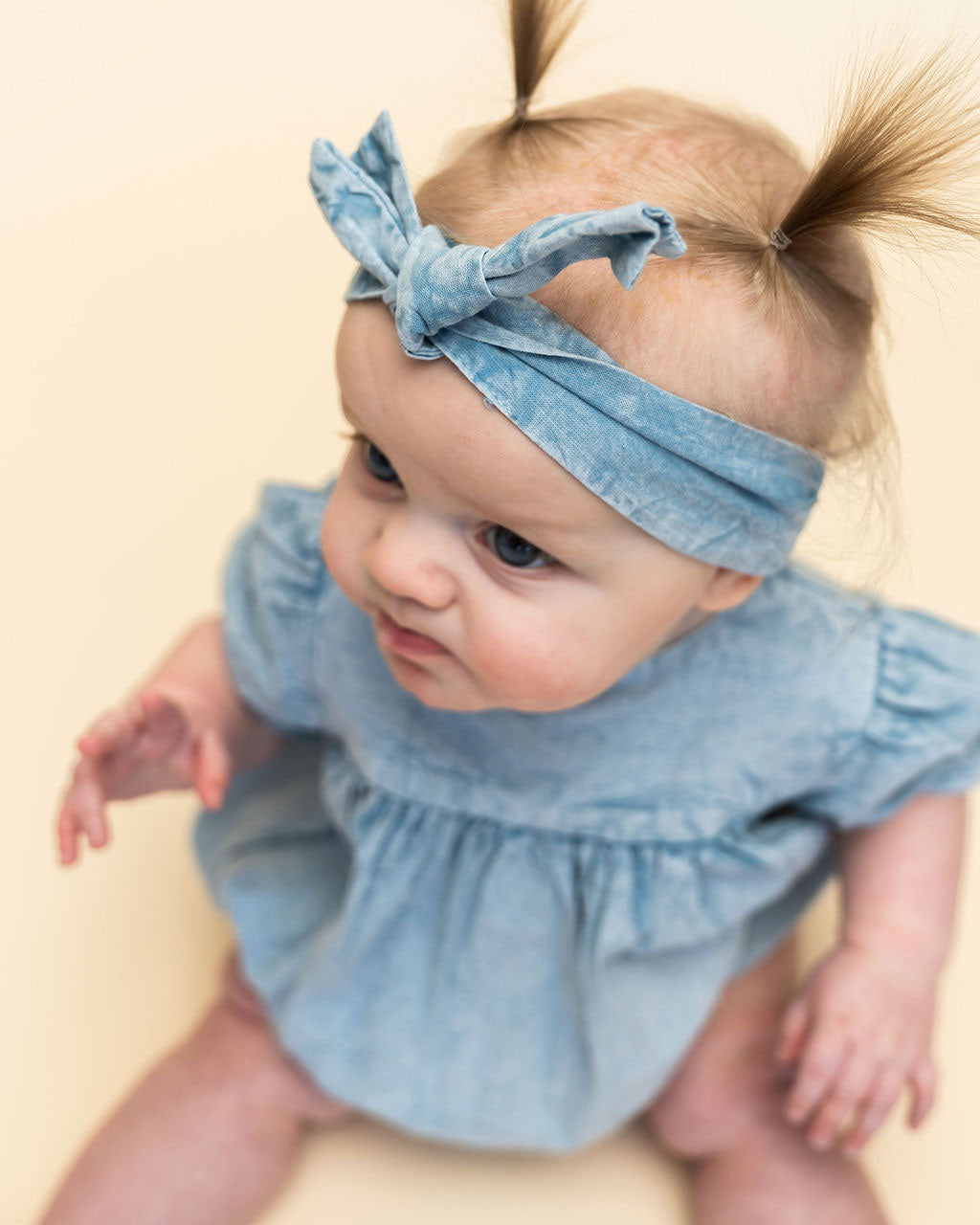 Aspen Soft Denim Washed Baby Romper (Organic) Lifestyle Model