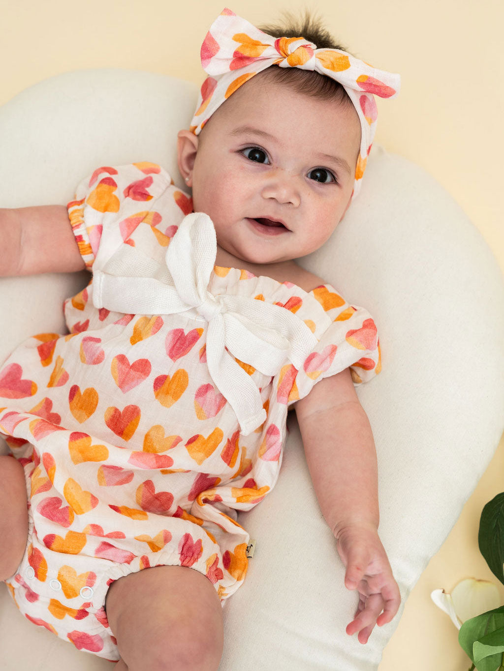 Hearts Baby Bubble Romper + Headband Full Lifestyle Model (Organic Muslin)